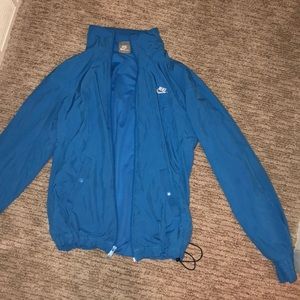 Blue Nike windbreaker